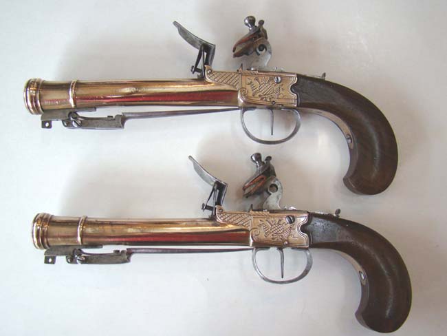 A Unique Large Pair of Unmarked, probably British, Engraved Brass Flintlock Blunderbuss Pistols with snap bayonets. Circa 1780-1800. — image 2